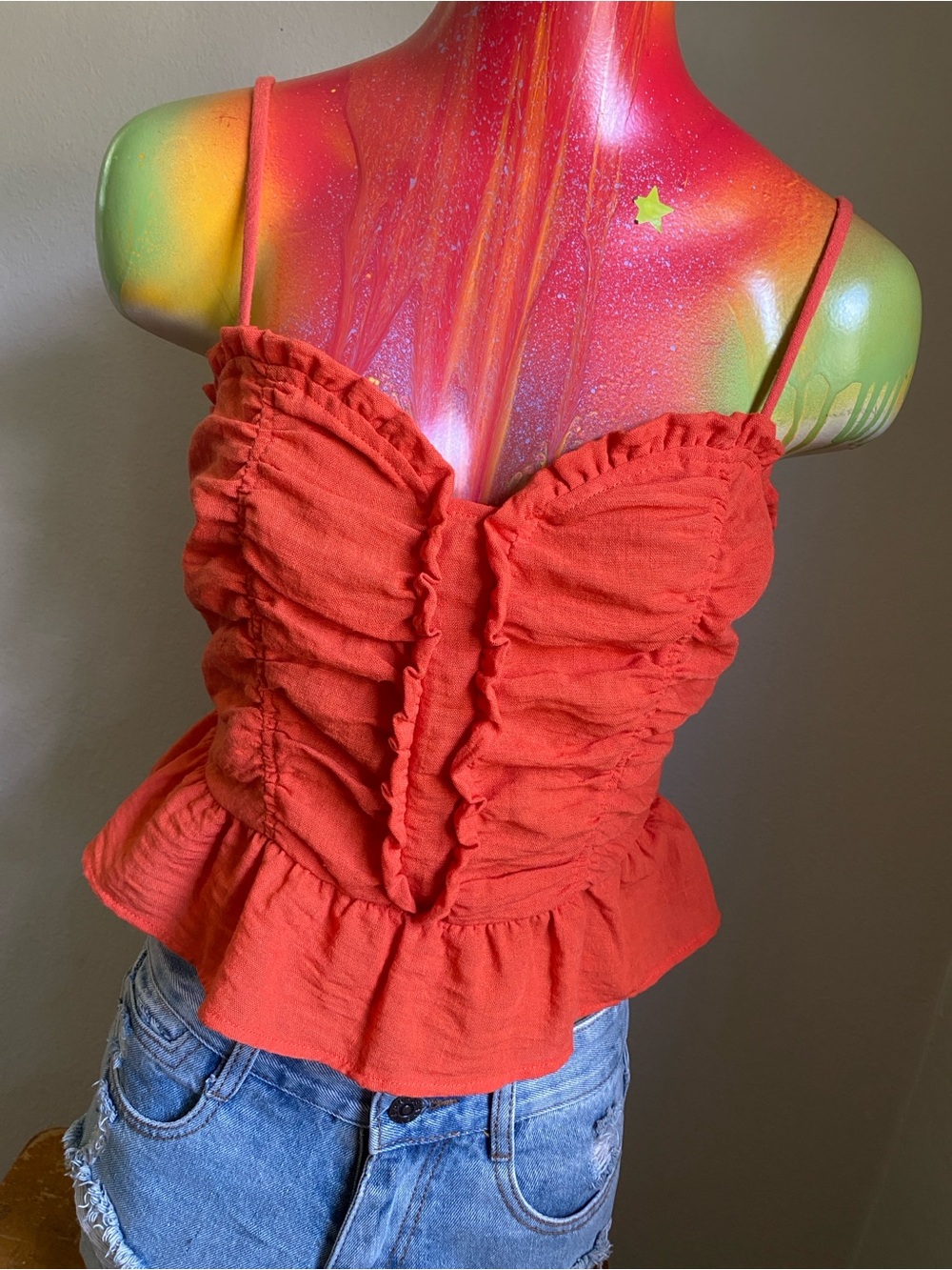 Sienna Sky Ruched Spaghetti Strap Peplum Cami in Orange